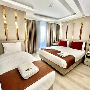 Deluxe Dreibettzimmer